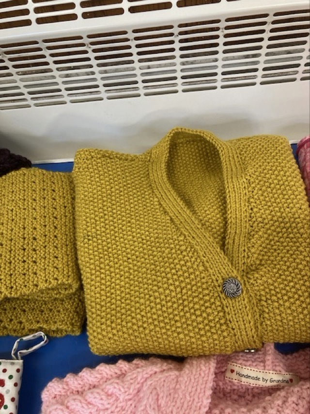 Cardigan and scarf made by Pat